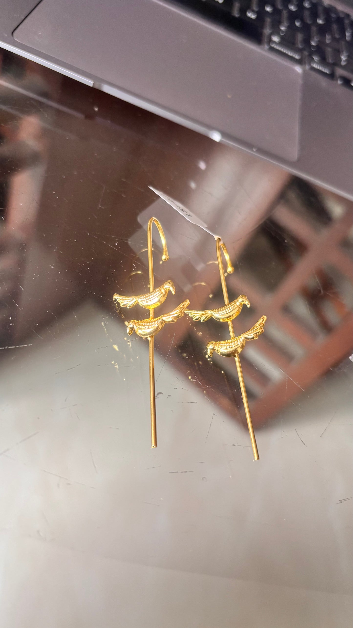 Sparrow ear cuffs