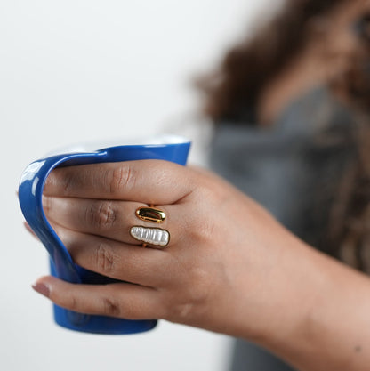 Statement open band ring with dual accents — polished gold-tone and textured pearl-inspired detail — styled by Adiva Jewelry, a modern lifestyle jewelry brand