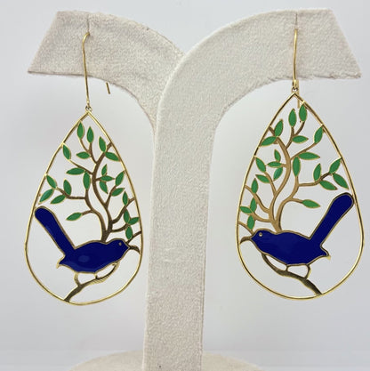 Handcrafted gold-toned statement earrings featuring a blue bird and tree motif – perfect party wear or a unique gifting choice from Adiva Jewelry