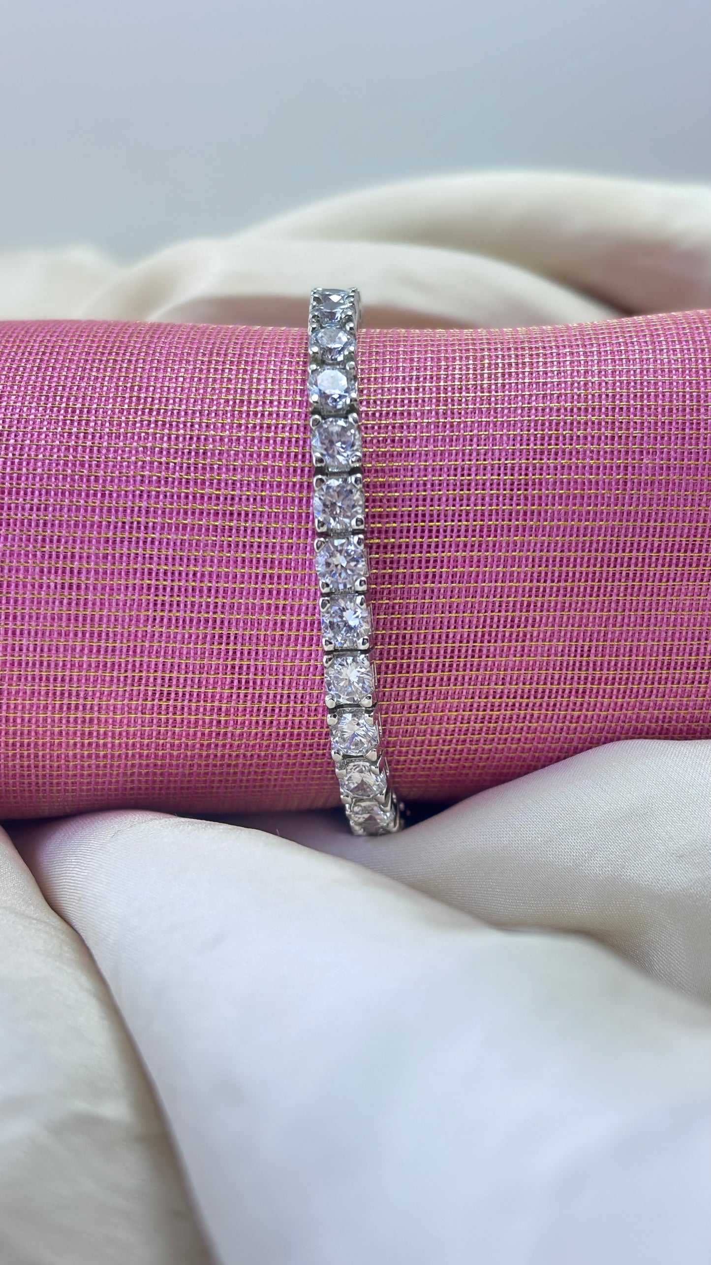 Sterling silver based tennis bracelet set with premium Cubic zirconia finished with rhodium polish - by Adiva Jewelry 