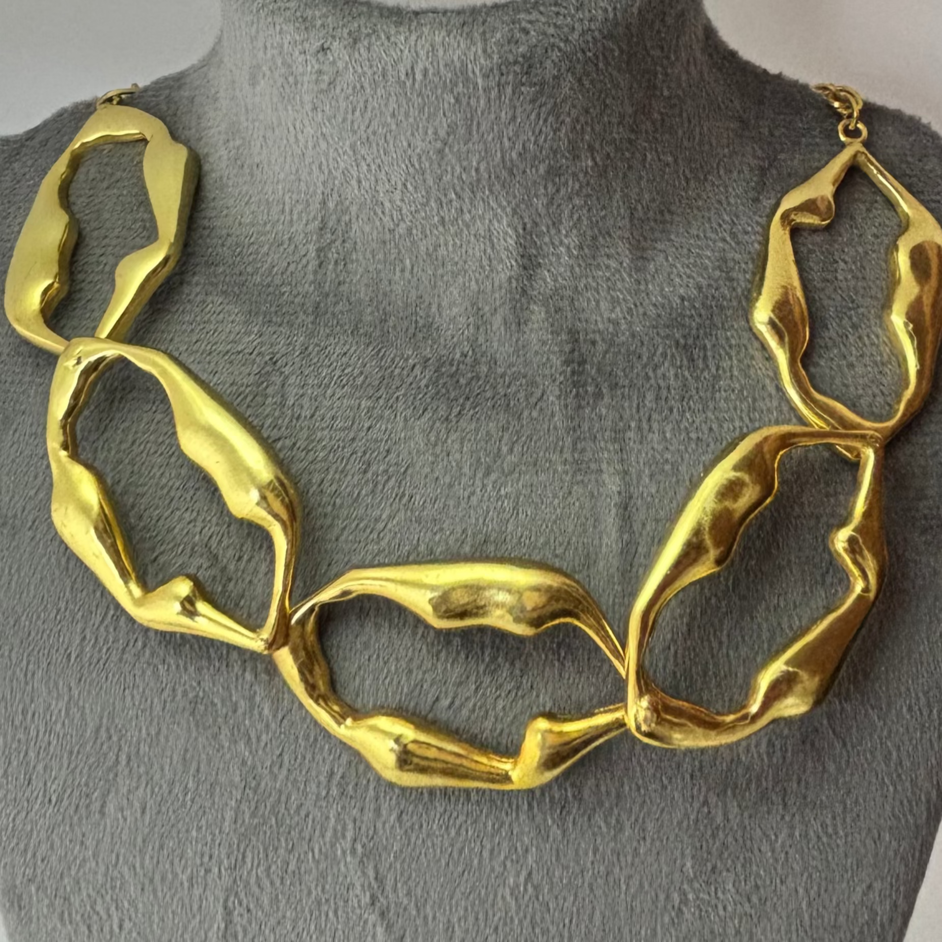 A sculpted necklace in premium gold plated finish by Adiva Jewelry for the bold woman who loves to express herself with jewelry