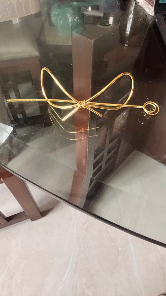 Bow hair cage