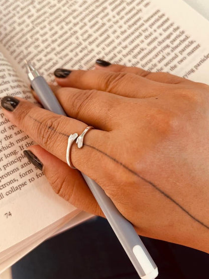 Sterling silver with rhodium plating self-hug ring. Everyday wear ring. Handmade by Adiva Jewelry 
