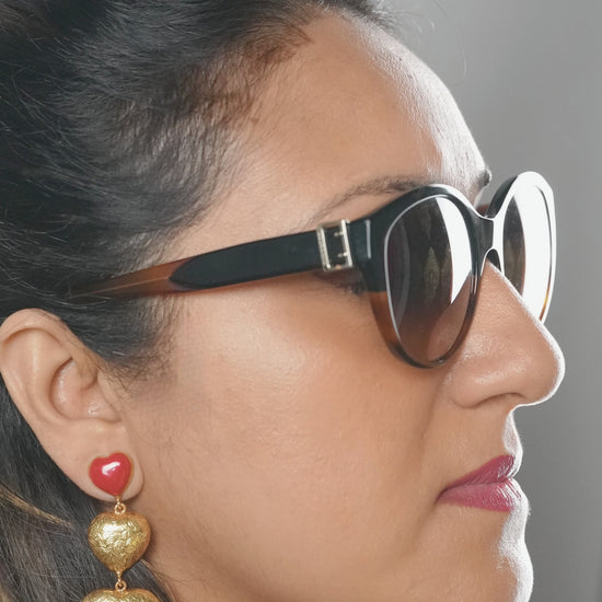 Heart-shaped brass statement earrings by Adiva Jewelry – handcrafted party wear accessory for women, ideal for festive occasions